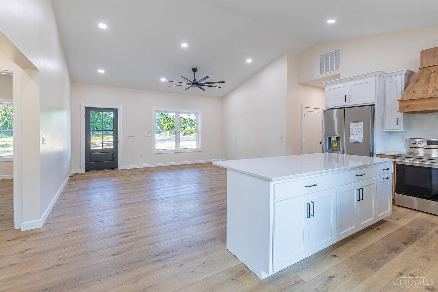 Custom kitchen with quartz island and Amish hand-built cabinetry