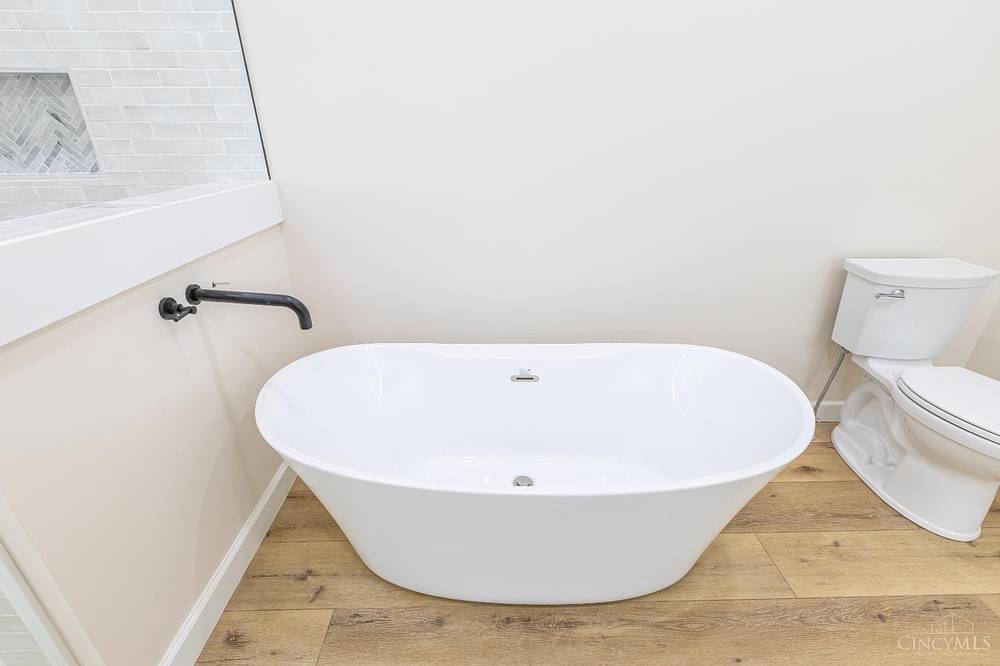 Freestanding soaker tub in the primary bath